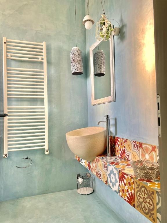 Masseria Sant'Eleuterio - camere e bagni 5